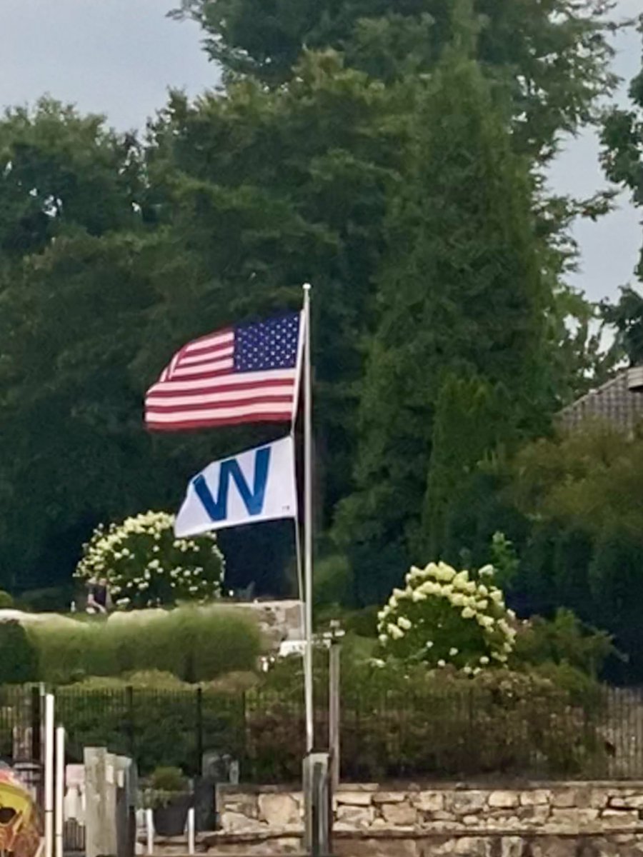 Baudeman's tweet photo. ⁦@KurtBusch⁩ Flying the two most important flags on Lake Norman tonight!!! Lets get a W ⁦@Cubs⁩ ⁦@WatchMarquee⁩ https://t.co/2QqAen2QWn