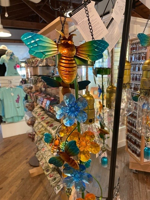 EdisonFordFL's tweet photo. For anyone that is looking to spruce up their outdoor garden, choose from a variety of honey bee and glass wind chimes and tropical plant holders. Other fun items include #EdisonFord refrigerator magnets featuring photos from the estate. Stop by today and let us help you shop! https://t.co/0yxYJTMY2k