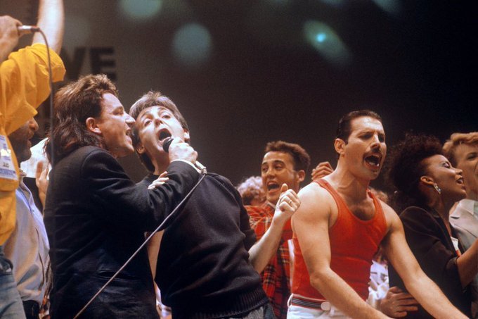 Bono, Paul McCartney, and Freddie Mercury at Live Aid, 1985