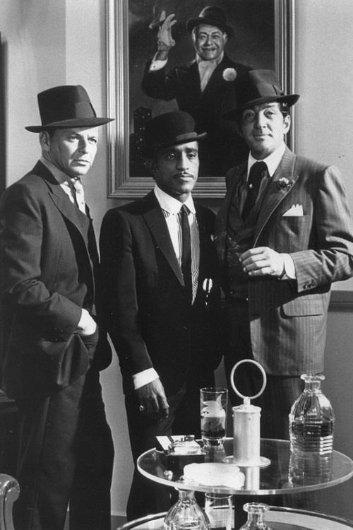Dear_Grateful1's tweet image. Frank Sinatra, Sammy Davis, Jr., and Dean Martin behind a portrait of Edward G. Robinson.

Photographed for Robin and the 7 Hoods (1964).