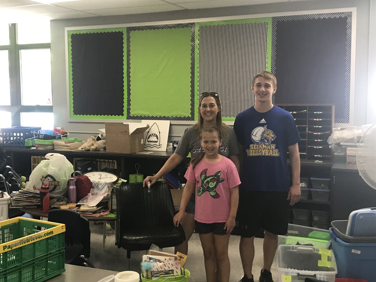AESBulls's tweet photo. Antonia staff return to unpack in the heat, optimistically waiting for crews to install their new AC units. https://t.co/qcHUtmE6BM