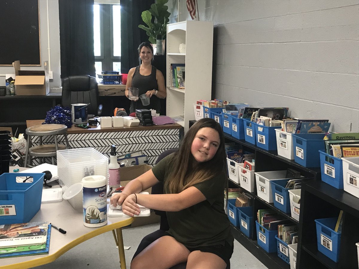 AESBulls's tweet photo. Antonia staff return to unpack in the heat, optimistically waiting for crews to install their new AC units. https://t.co/qcHUtmE6BM