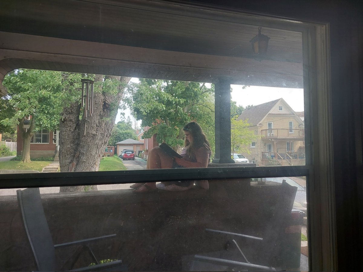 Just another hot summer afternoon for my girlie. Taken to reading out on porch when it gets too hot indoors!