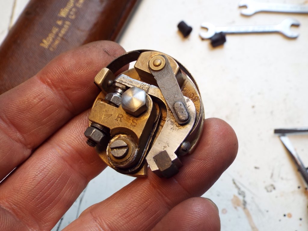 Turning and fitting new bushes to a contact points set for a Bentley. Points pivot bush is Tufnol with a straight knurl.