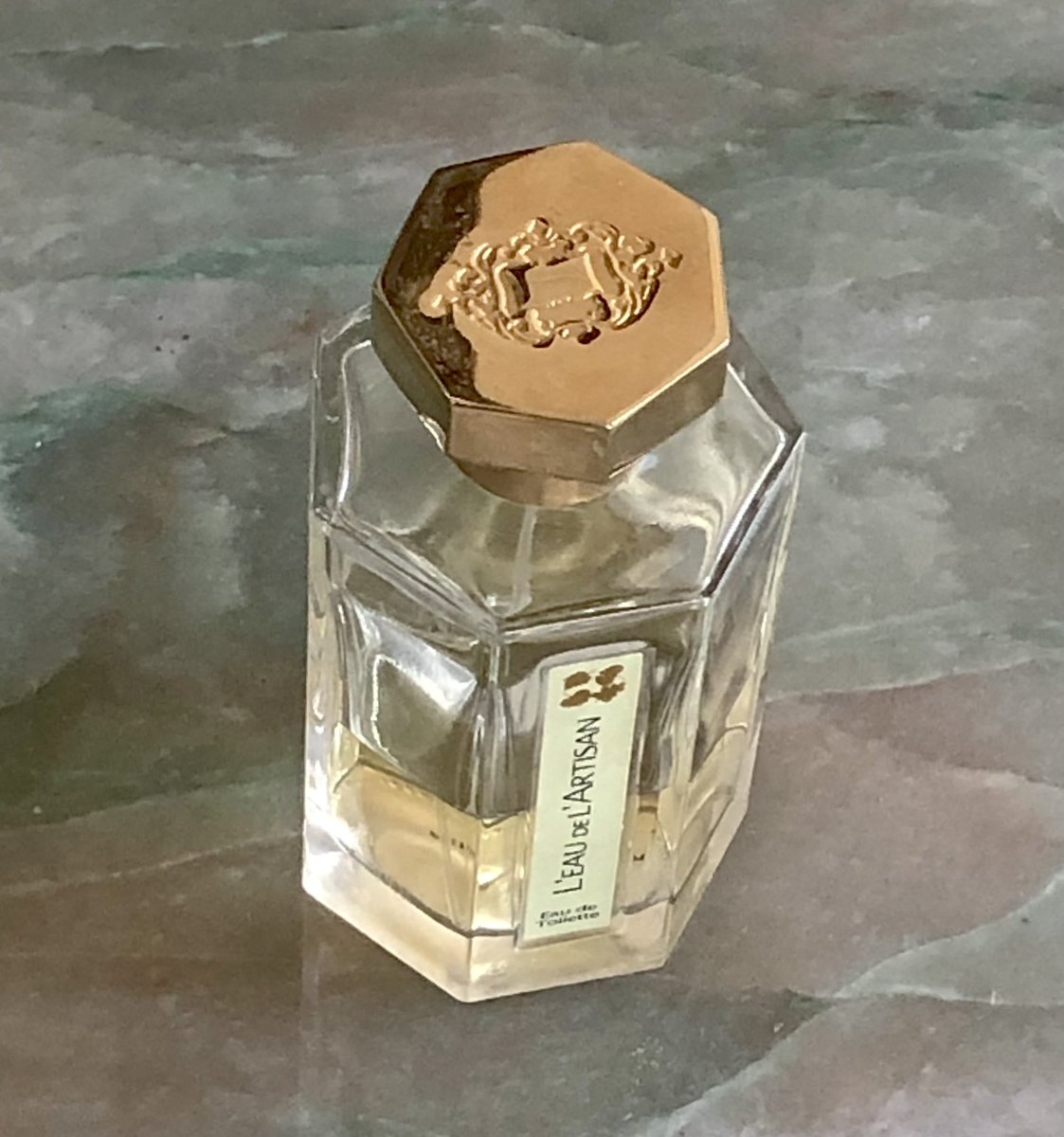 Geometiles's tweet photo. Joining the #mathphoto21 challenge late this year, so this entry is both for #seven and #symmetry . Notice anything unusual about this @LArtisan bottle?How often  do you see a regular #heptagon in the wild? What’s the symmetry of the bottle w/ and w/out the cap?#iteachmath #MTBoS https://t.co/bcDA6lig0e