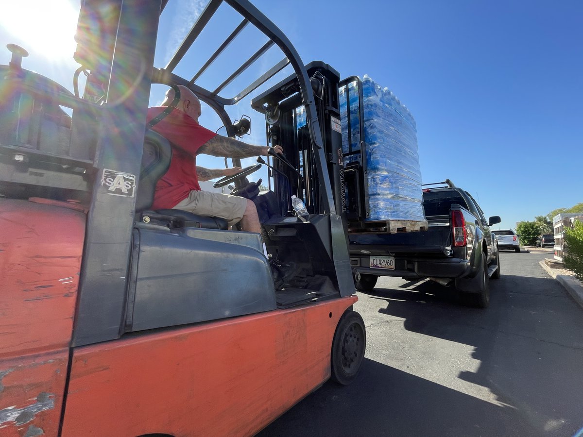 phxmission's tweet photo. 386,212 bottles of water already distributed in #CodeRed2021. We continue reaching our homeless neighbors and serving partners through our Maricopa County Heat Relief Network. Thank you donors who are making this massive effort possible! https://t.co/5yUGjV2KDP