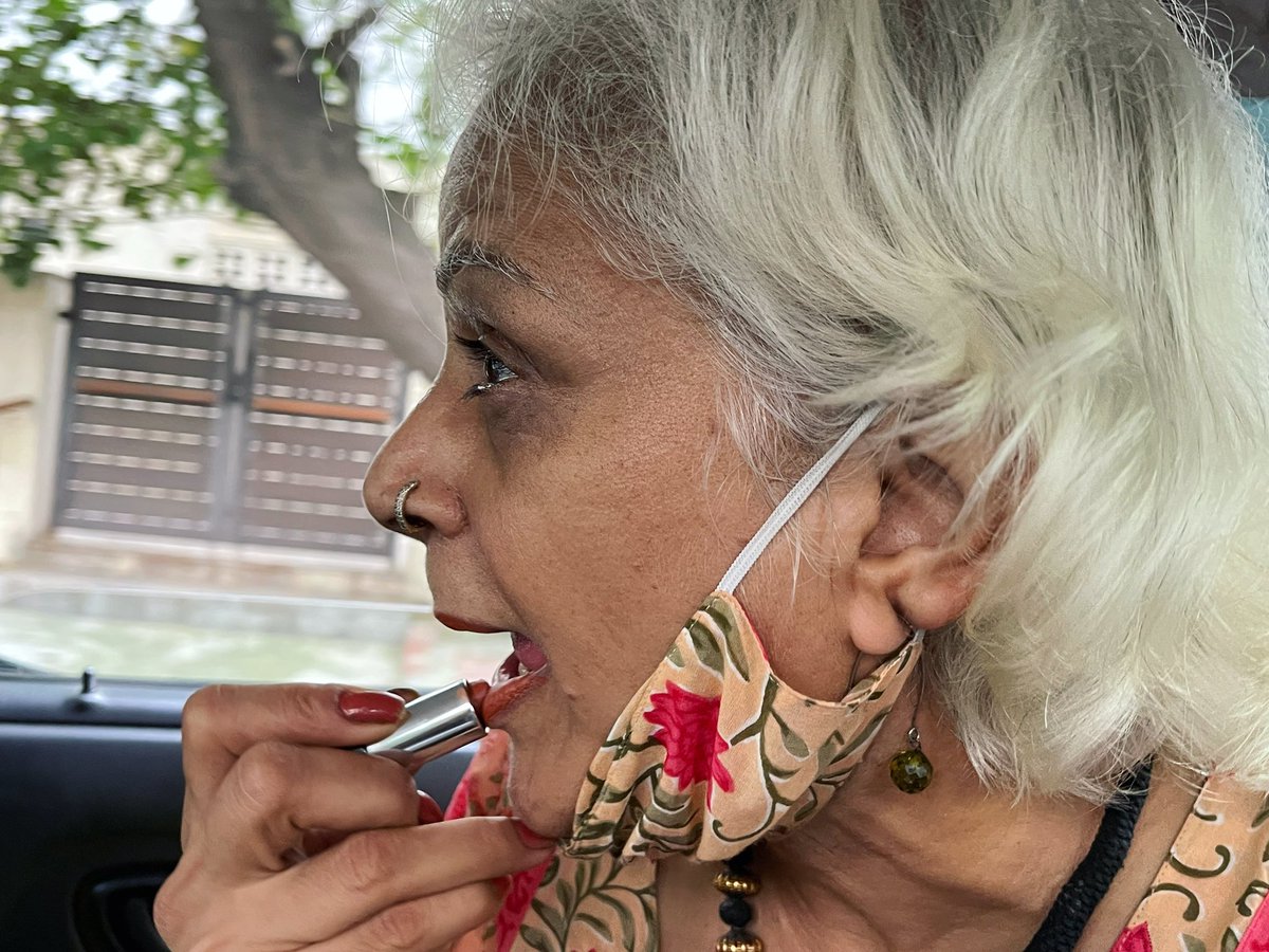 thedelhiwalla's tweet photo. Masked Lady Putting on Lipstick… an Intimate Portrait https://t.co/jWwXJu3HEB