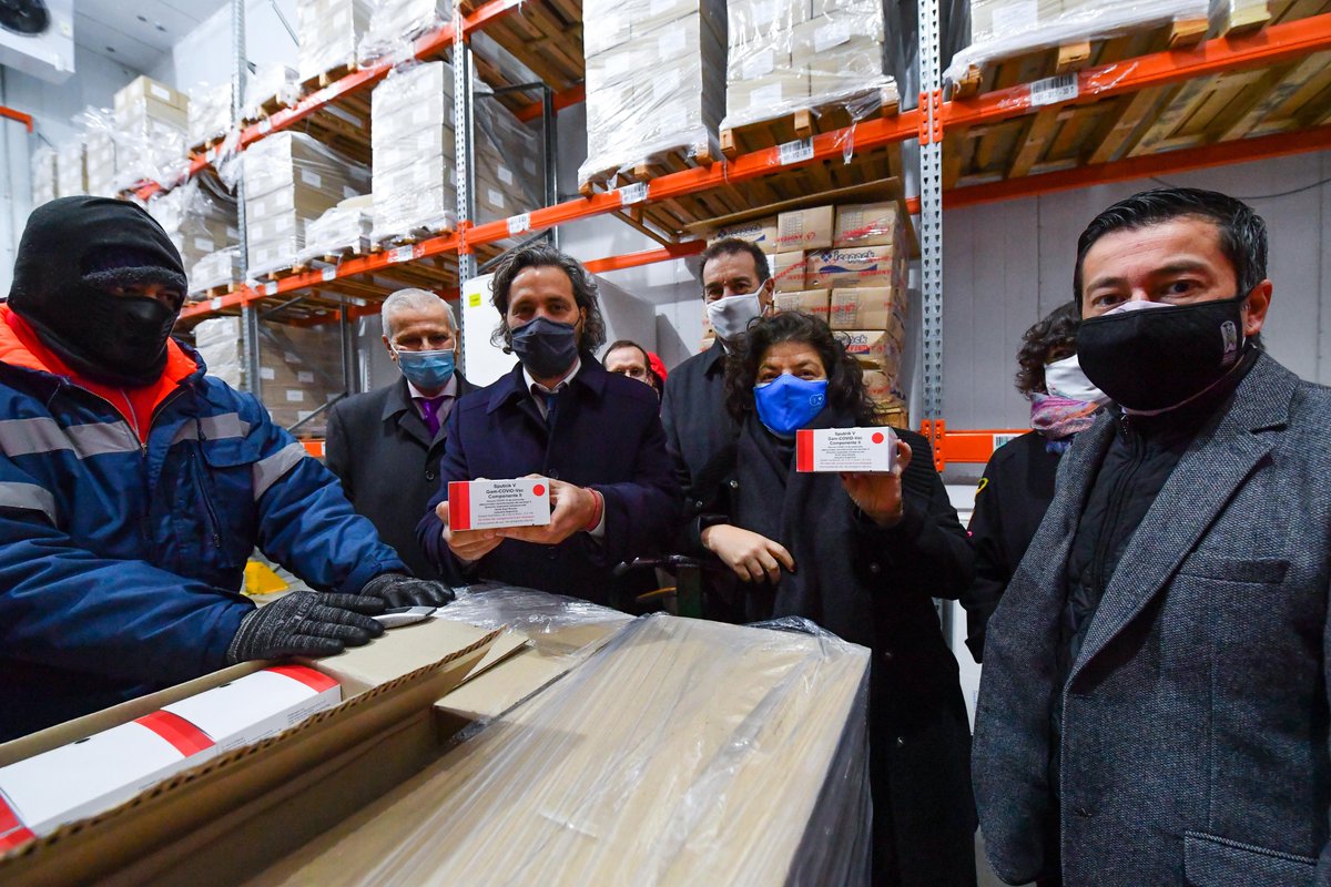 sputnikvaccine's tweet photo. #Argentina’s Health Minister @carlavizzotti &amp; Chief of the Cabinet of Ministers @SantiCafiero receive the 1st batch of the #SputnikV vaccines produced in Argentina by @richmond_lab https://t.co/dz11dKYOT5