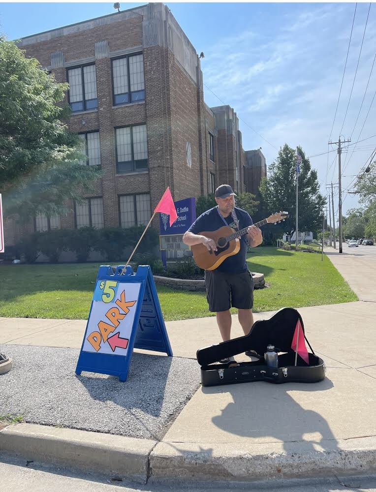 goelzg's tweet photo. Going to the @wistatefair?  Park @DottkePBLHS where 💯% of the 💰 raised goes directly to our kids!

And, you might even catch teacher @papagoose_cw giving out a free concert!
#wawmproud https://t.co/dTlIJB3VZs