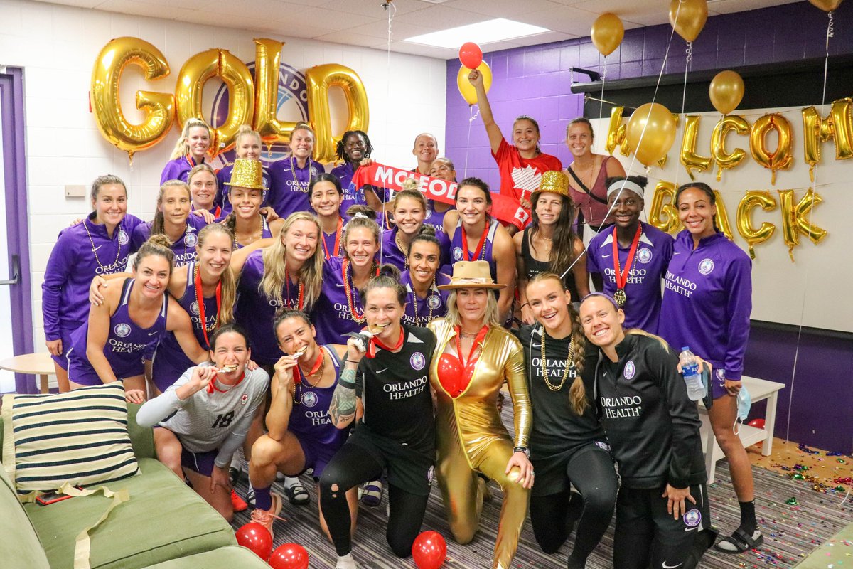 ORLPride's tweet photo. A proud family welcoming back our Olympic Champ @erinmcleod18!🥇💜 

#Tokyo2020 | #AdAstra https://t.co/wF37Fu2krR