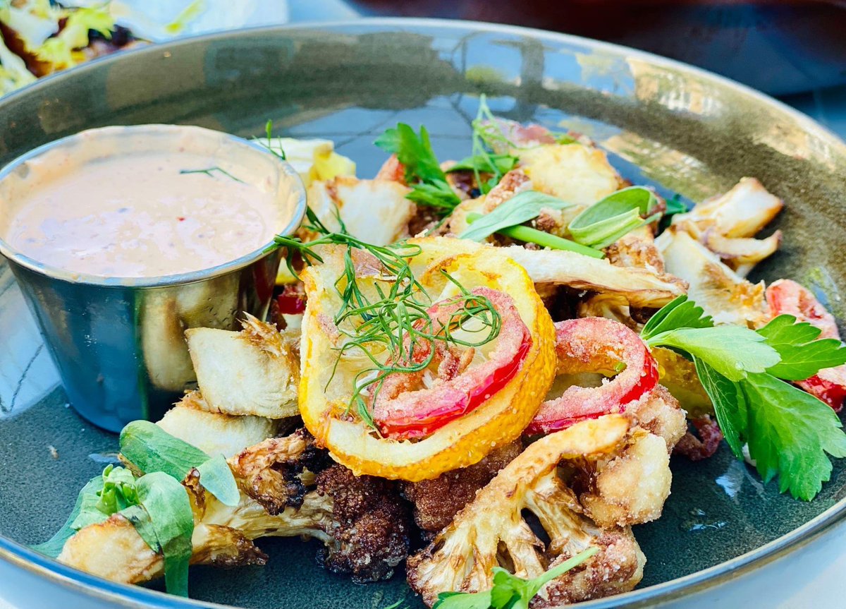 Fried Cauliflower and Artichoke Hearts, cauliflower, citrus, harissa yogurt, honey. My favorite summer bites. 
LeSudChicago.com