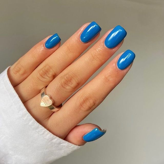 Elevate Your Festive Look with Blue and Silver Christmas Nails