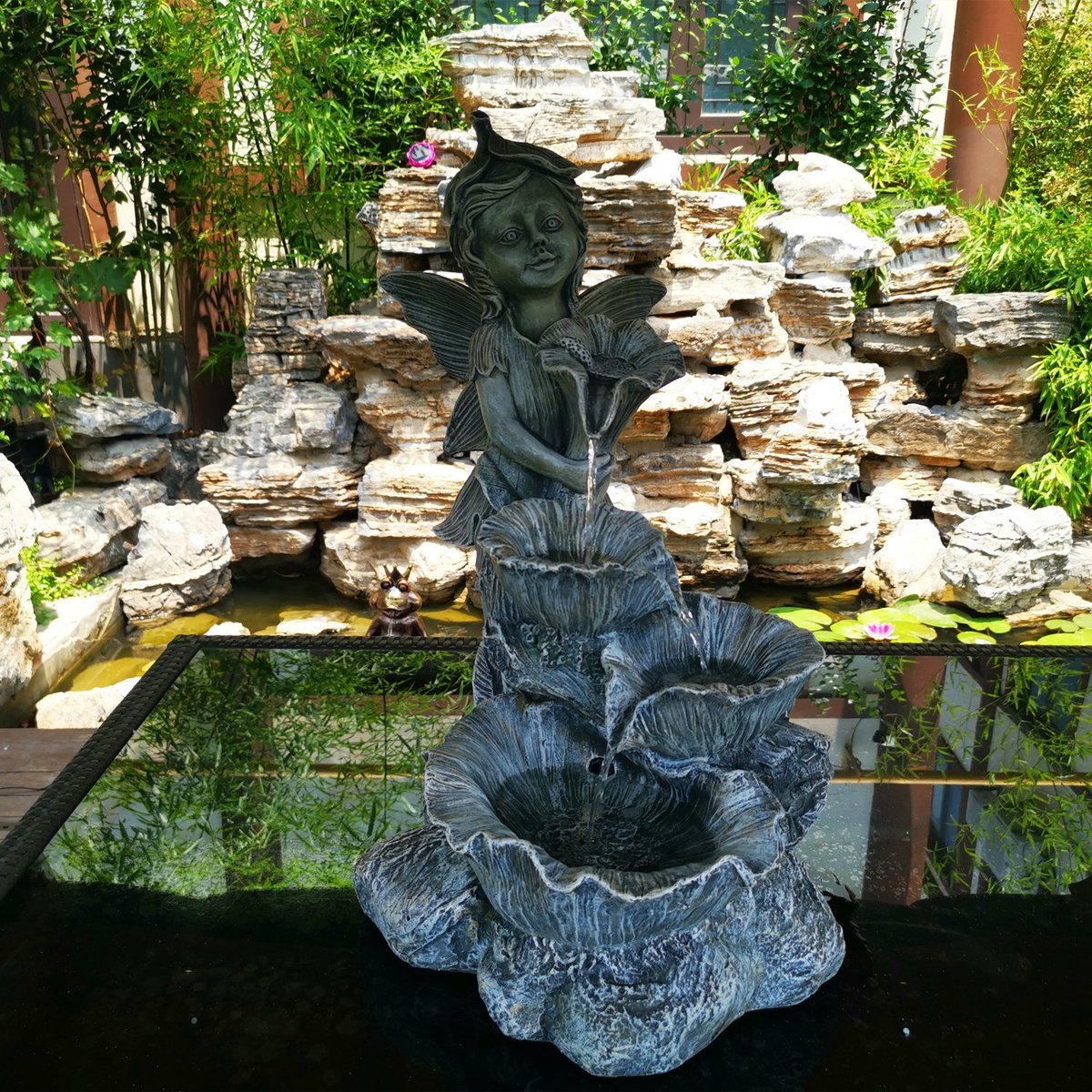 Outour1983's tweet photo. This exquisite four-tier angel fountain has built-in LED lights in three tiers, it can bring beauty and peace into your outdoor living area. And its angel holding a flower with a smile shape can make people feel happy and relax. 😀😀#fountain #gardendecor https://t.co/8adCVxBSlH