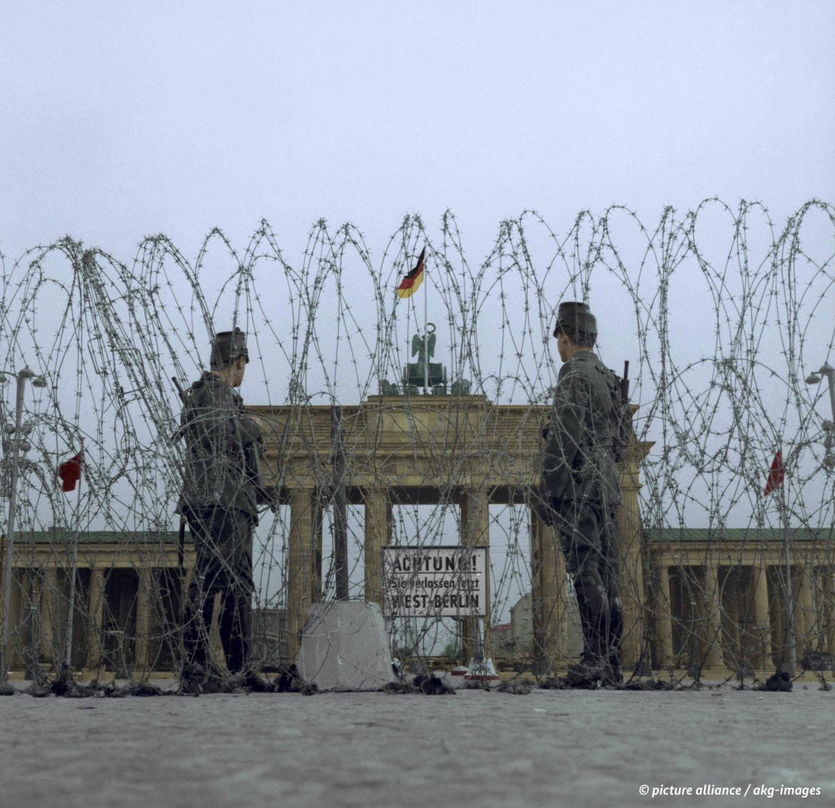 germanyintheeu's tweet photo. #BerlinWall: 60 years ago, GDR security forces sealed off the sector border in #Berlin, leading to more than 28 years of division. Today, we are setting our 🇩🇪 flags at half-mast and remembering the over 140 victims who lost their lives. Thankful for #europeunited 🇪🇺! https://t.co/m2zkJToido
