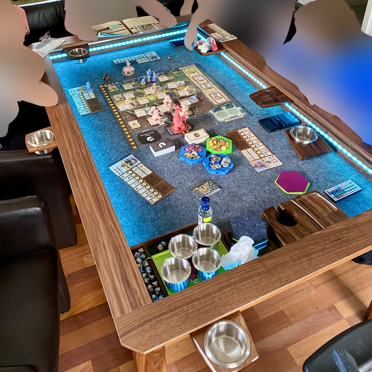 My own 2021 custom gaming table setup. Heavily inspired by the Wyrmwood MGT, but self-designed and made with custom measurements and LED lights. Here playing Munchkin Dungeon with friends.