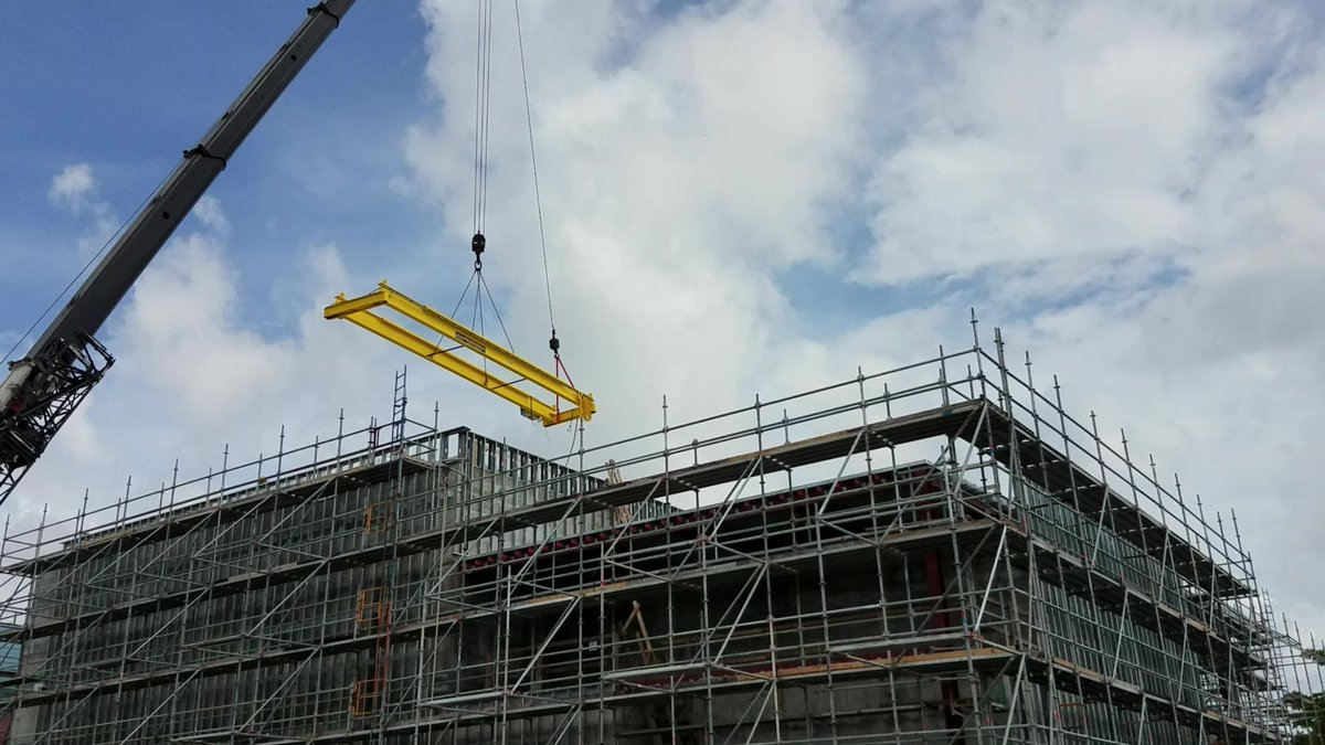 Complicated installs? No problem. 
 We installed this 13T bridge crane into a new construction building by using a tower crane and having our team inside at the ready to help lower & fasten the crane to the runway.

#overheadcranes #newconstruction #engineering #liftingequipment