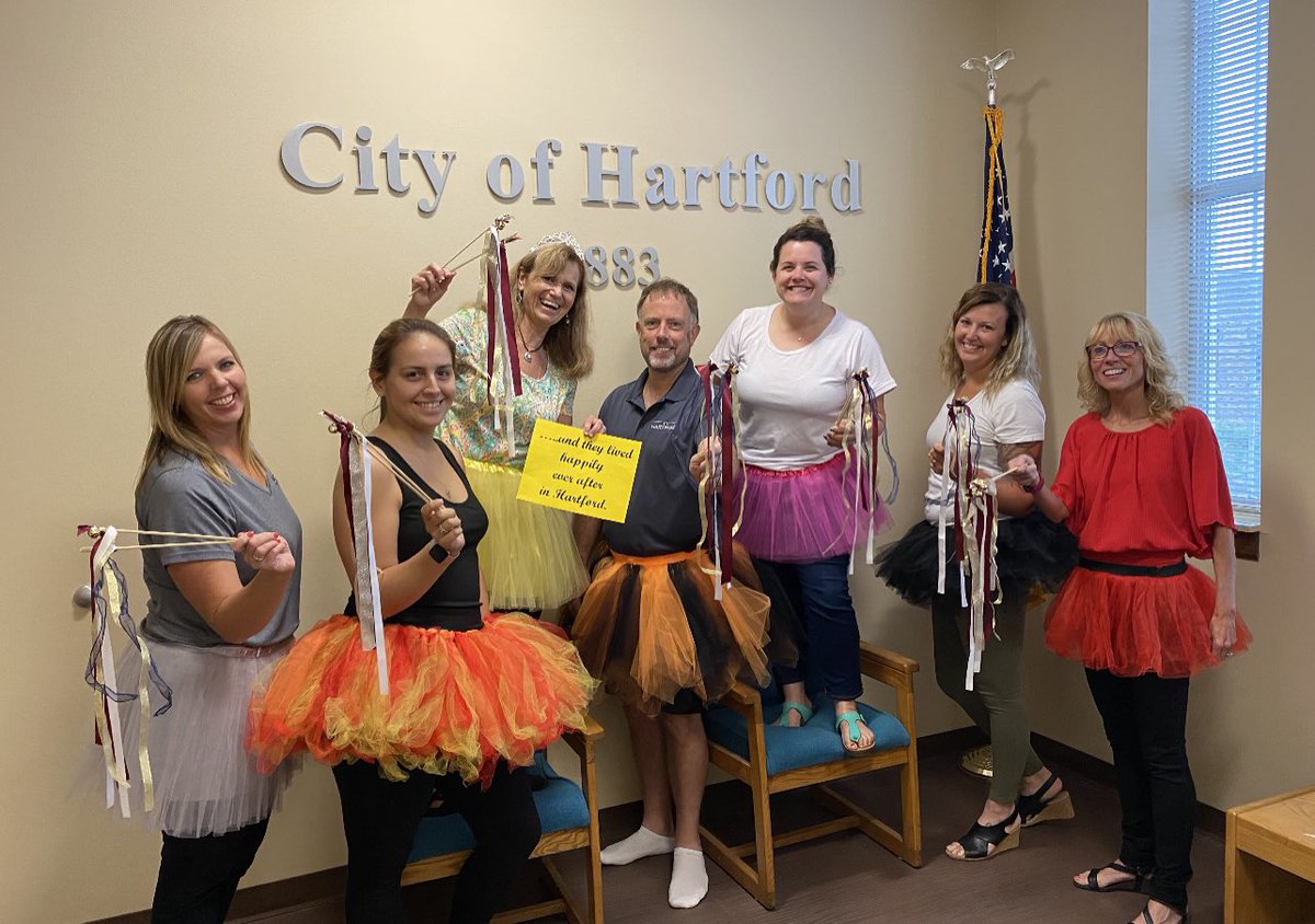 Our City Administrator Steve is so excited for #CityHallSelfie Day he dressed up for the occasion! Great sign and nicely dressed up team! <a href="/LeagueWIMunis/">League of Wis Munis</a> <a href="/ELGL50/">ELGL: Engaging Local Government Leaders</a> @CityHallSelfie #hartfordproud