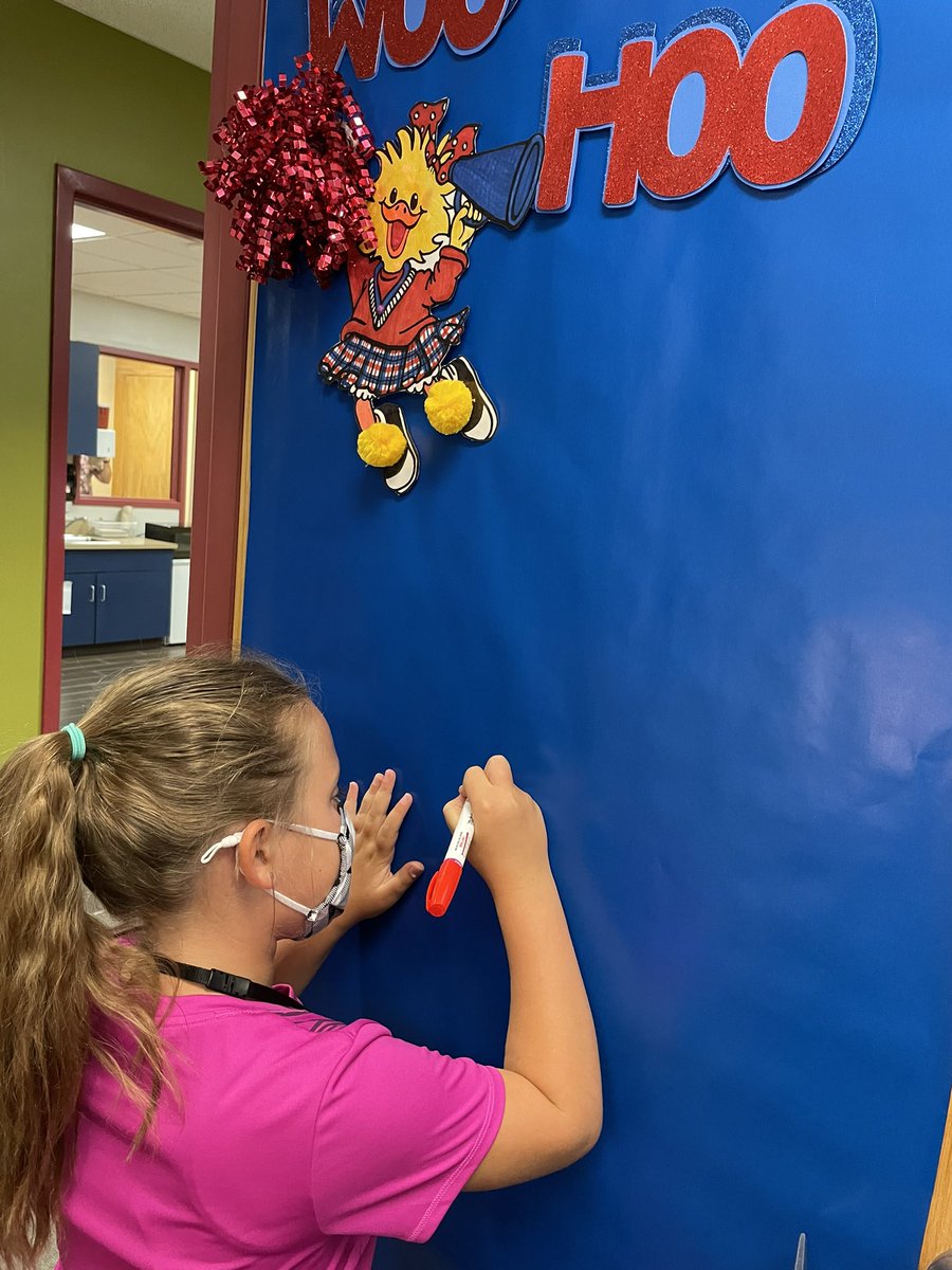 First Heusner student to sign the Woo Hoo door!  #HeusnerPride