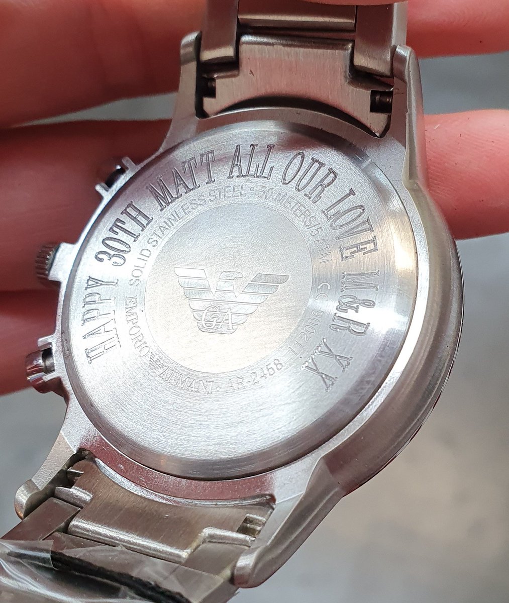 Col_cub's tweet image. Nice watch back engraving, giving that lovely gift the personal touch #timpson #armani @TimpsonNews @darrenbrowna6