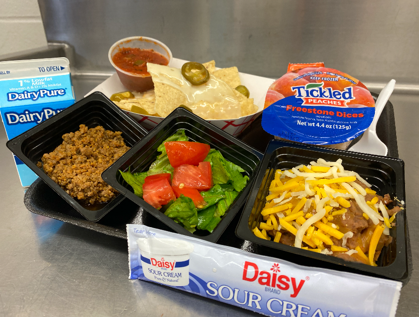 CCSDGaSNP's tweet photo. Nacho day = a student favorite! In 'queso' you didn't know, our whole-grain tortilla chips are #georgiagrown‼️ The whole-grain crunchy corndogs are a big hit too. Check out the school lunch goodness at @HFThunderbirds & @R_M_Moore_Elem! 😋 #FuelingGA #fuelingccsd #KeepingGAFed https://t.co/6f6juJwRqz
