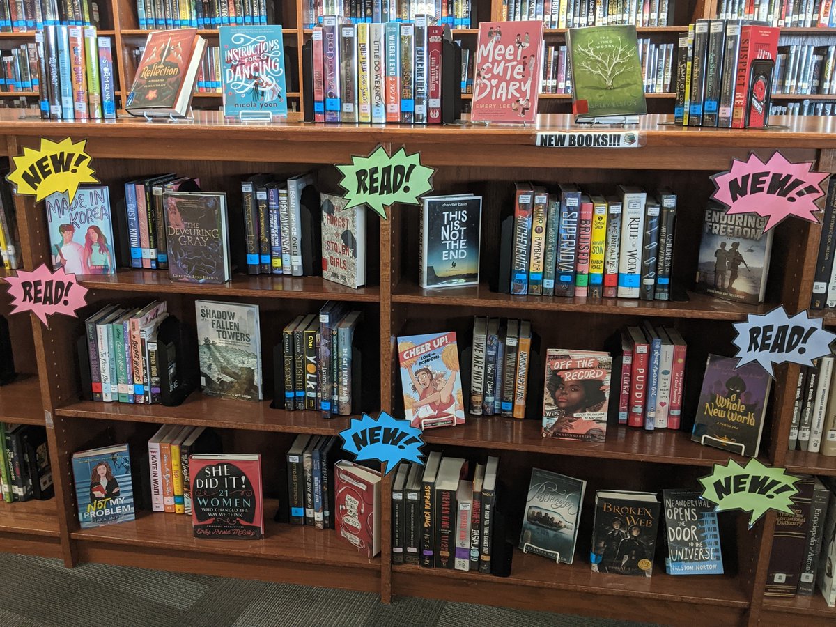 Our new books display is overflowing (and we've already checked out a ton of new books earlier this week)!