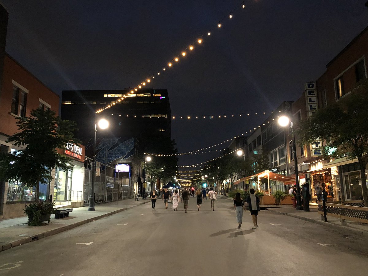 CL_opez's tweet photo. It was great to walk up @StLaurentLaMain during a street fair. There’s something beautiful about walking under the lights. #mtlsummer https://t.co/yLo2cG6zni