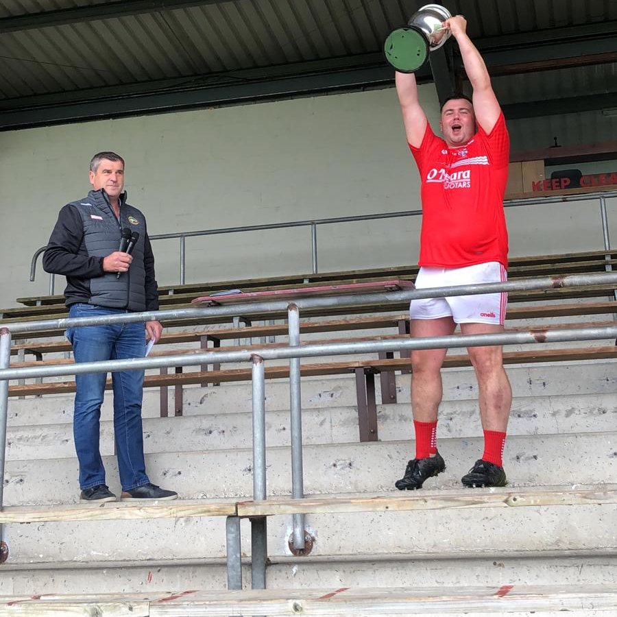 Offaly_GAA's tweet photo. The long wait is over!

Congratulations to @ShinroneGaa, winners of the @MolloyPrecast 2020 Offaly Intermediate Hurling Championship final.

Captain, Shane Sampson received the Cup from County Board Chairman Michael Duignan. https://t.co/EAAkTrO46C