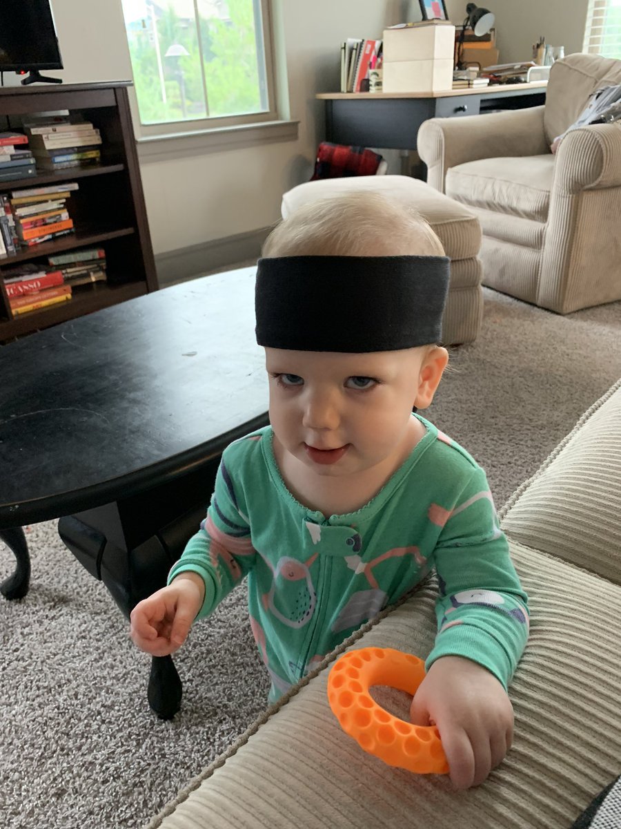 MrSapenoff's tweet photo. My daughter practicing her serious face while wearing mom’s headband. Bow to your sensei! https://t.co/lmlV6wdYEM