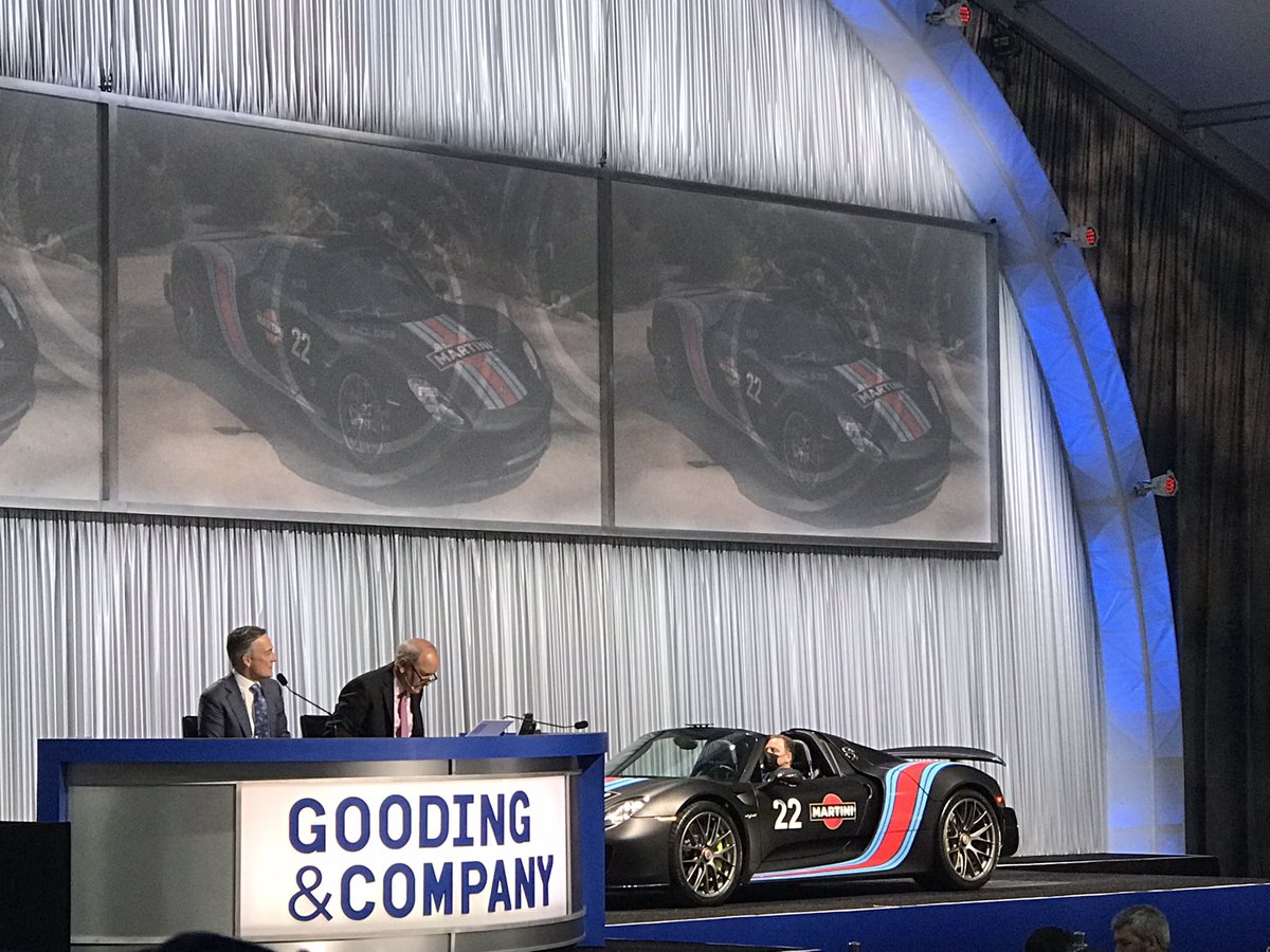 goodingandco's tweet photo. Sporting factory paint-to-sample in Metallic Oryx White with a factory-applied Martini Flat Black Wrap, this groundbreaking 2015 #Porsche 918 Weissach Spyder is sure to turn heads — and it's out the door for $1,682,500! #SOLD #GoodingPebble https://t.co/ClGZ0DrLAi