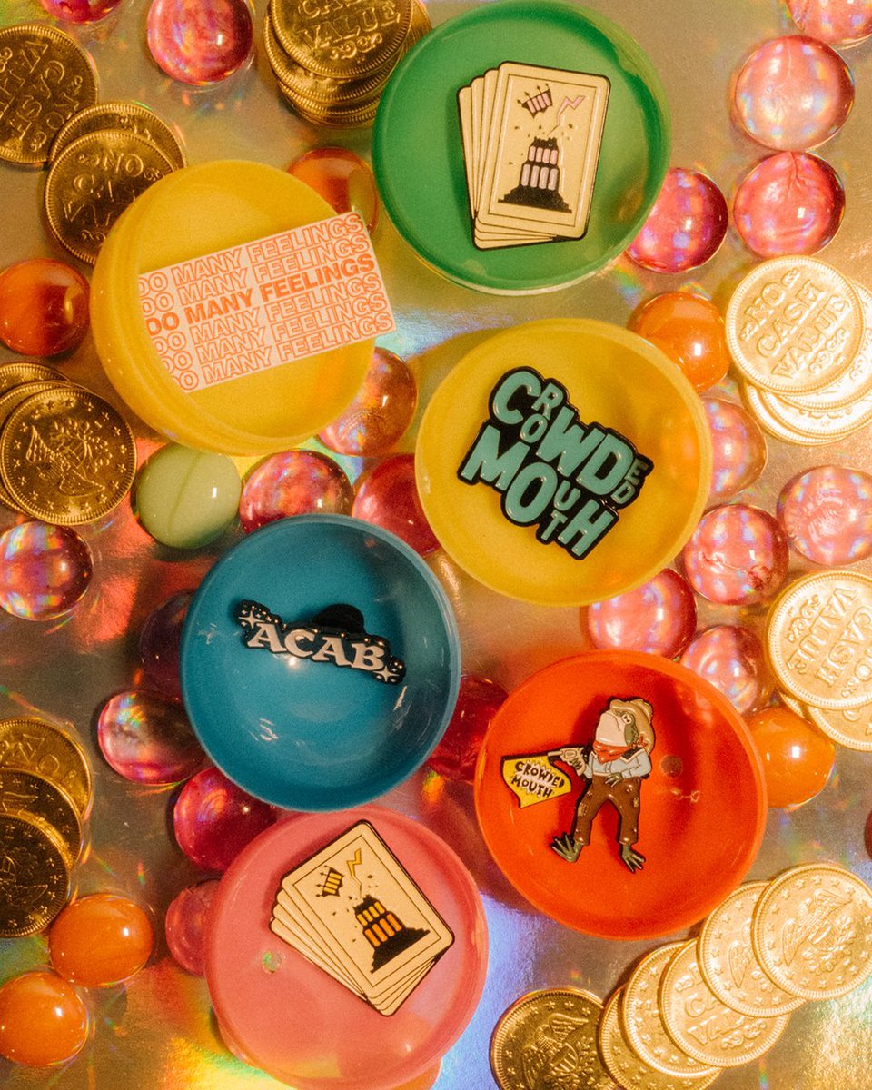 crowded_mouth's tweet photo. here’s just a ✨f e w✨ of the pins that are in our capsule machine in store! i’d show you the golden tickets but i didn’t want to move them from their spots in the machine! 
$5 for a token! you’re guaranteed a sticker &amp; a pin unless you win the golden ticket! https://t.co/izocJ1bRws