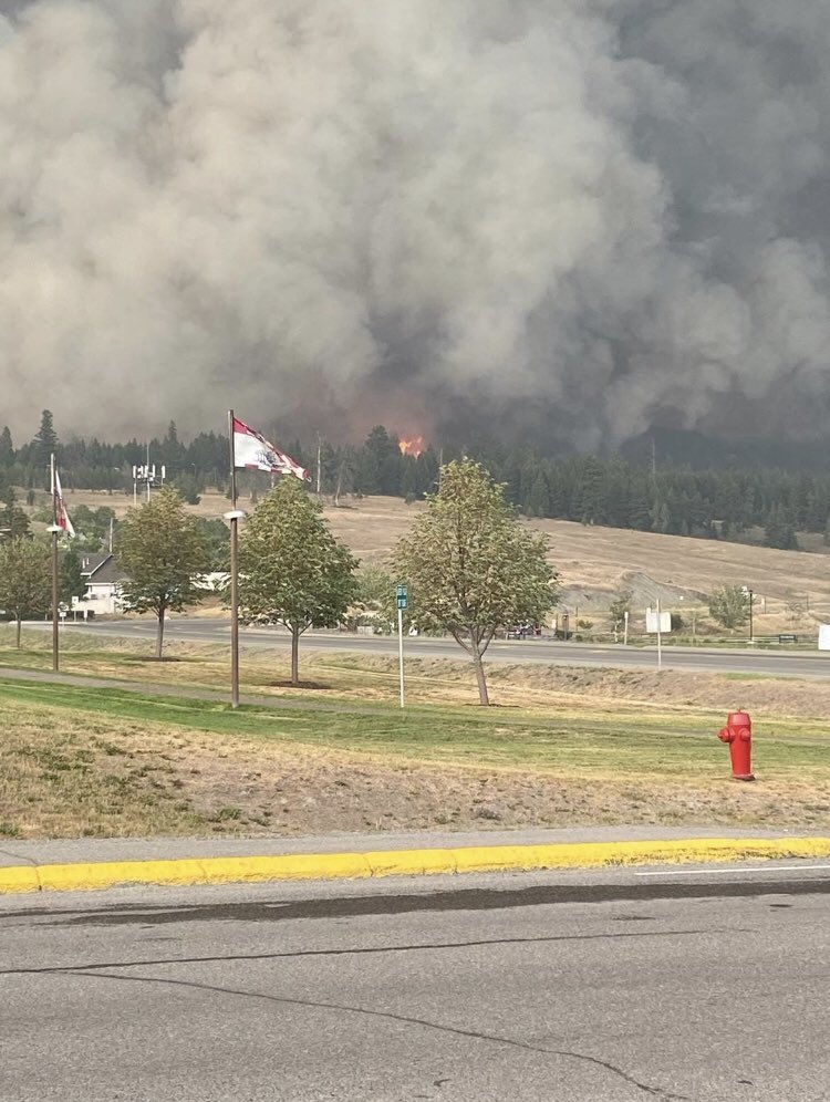 NEW: No homes lost in #LoganLake today as the Tremont Creek wildfire has come within 1km of some homes, and is burning directly besides Highway 97D on east entrance of town. Photos/ update below from Logan Lake Fire Dept. #bcwildfires @RadioNLNews