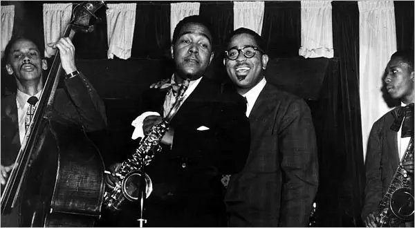 Born on this day and always in flight, the one and only, #CharlieParker. Bird and Diz here, with a young #Coltrane looking on. Bird discovered the Atom - Trane smashed it.