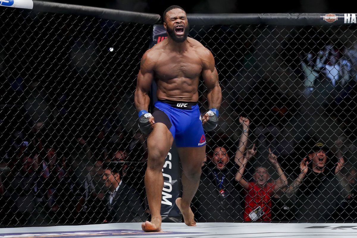 MMAHistoryToday's tweet photo. Some fans have had their ups and downs with Tyron Woodley.  

Throughout it all, he’s remained the same. This man is a true fighter. 

If he defeats Jake Paul tonight, his name “The Chosen One” will all make sense. https://t.co/PDVKPGue45
