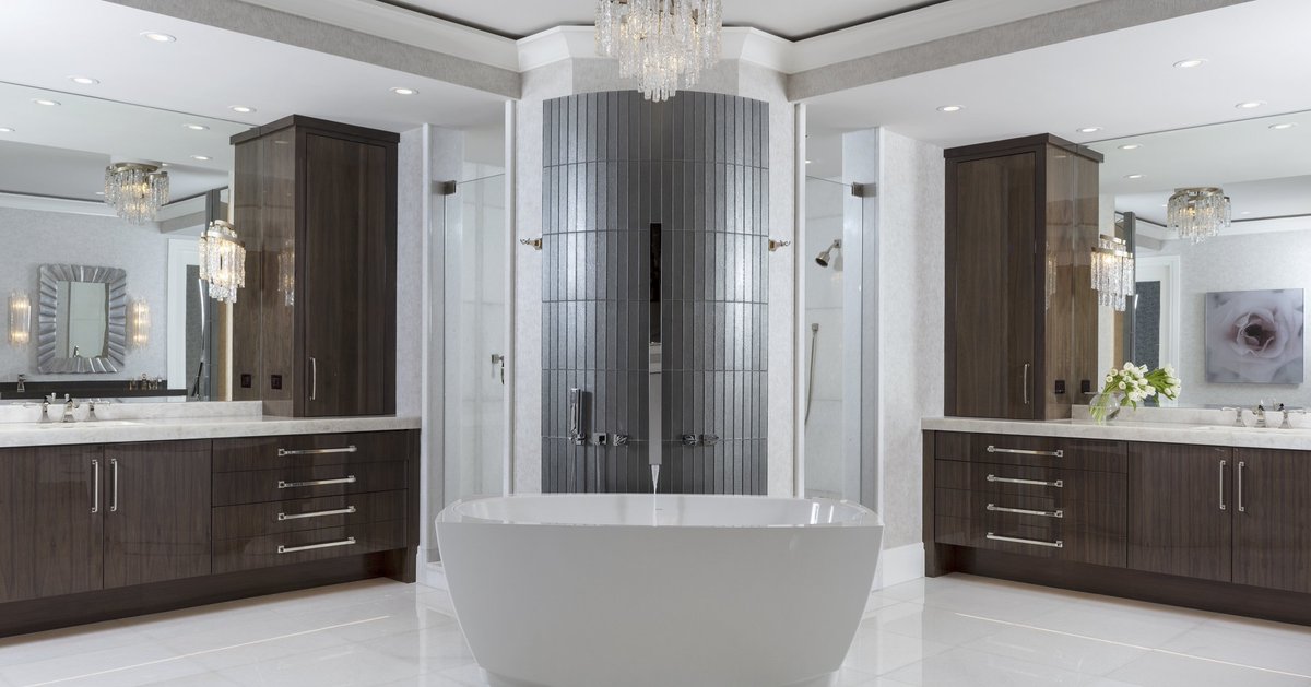 collins_dupont's tweet image. Dark wood cabinetry with a high gloss finish, sleek hardware and a custom metal wall treatment behind the free-standing tub work together to create a contemporary and stunning master bath.

Designed by Sherri DuPont, President, Principal Owner, ASID.