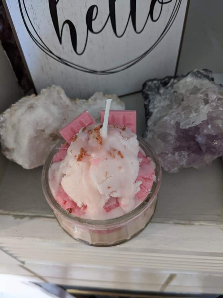 Hi please support my candle business. Here's a candle I made to look like ice cream for summer! It is vanilla and strawberry scented ❤️