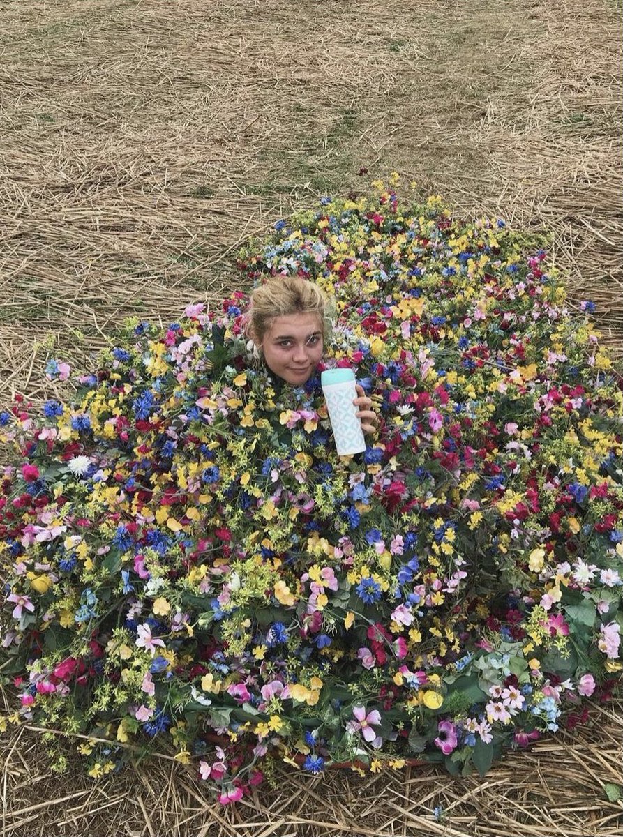 yelenaspugh's tweet photo. always thinking about these photos of florence pugh taking a break from filming whilst wearing the may queen dress https://t.co/Gd5IkhLp8Q