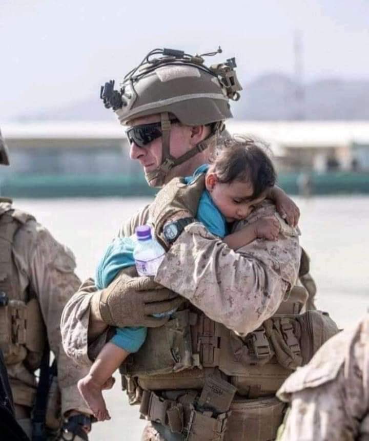 ZahraniAbidi's tweet photo. He killed his parents, bombs their house, steals their money, and depicts to the world that he is carrying the son with tenderness. https://t.co/GFADxV4phV