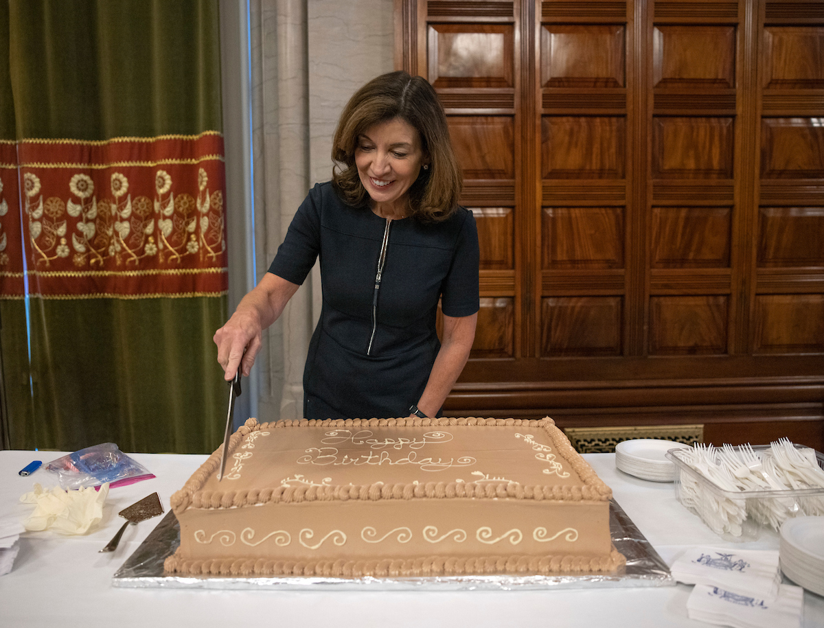 Governor Hochul cuts into birthday cake 
