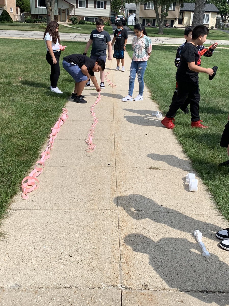 More chain making! We measured our chains to see which was the longest. The kids did such a good job working together. Some had no idea where to start and by the end they had an awesome chain!!