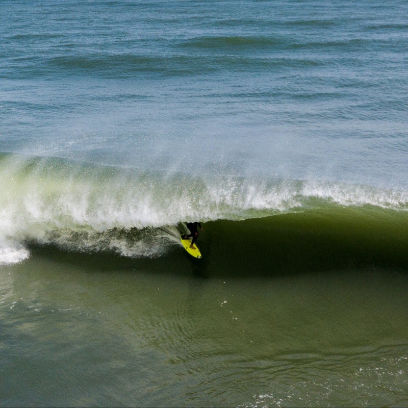 surfline's tweet photo. Three tales of East Coasters catching hurricane swells right at home.