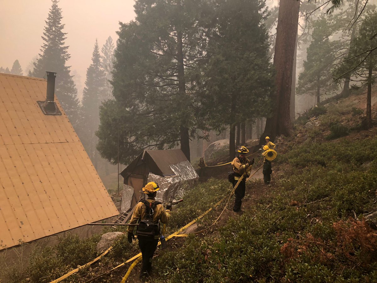 CALFIREAEU's tweet photo. A multitude of fire resources are in the community of Strawberry  working hard defending structures.  
#CaldorFire https://t.co/P6wqqoAUc0