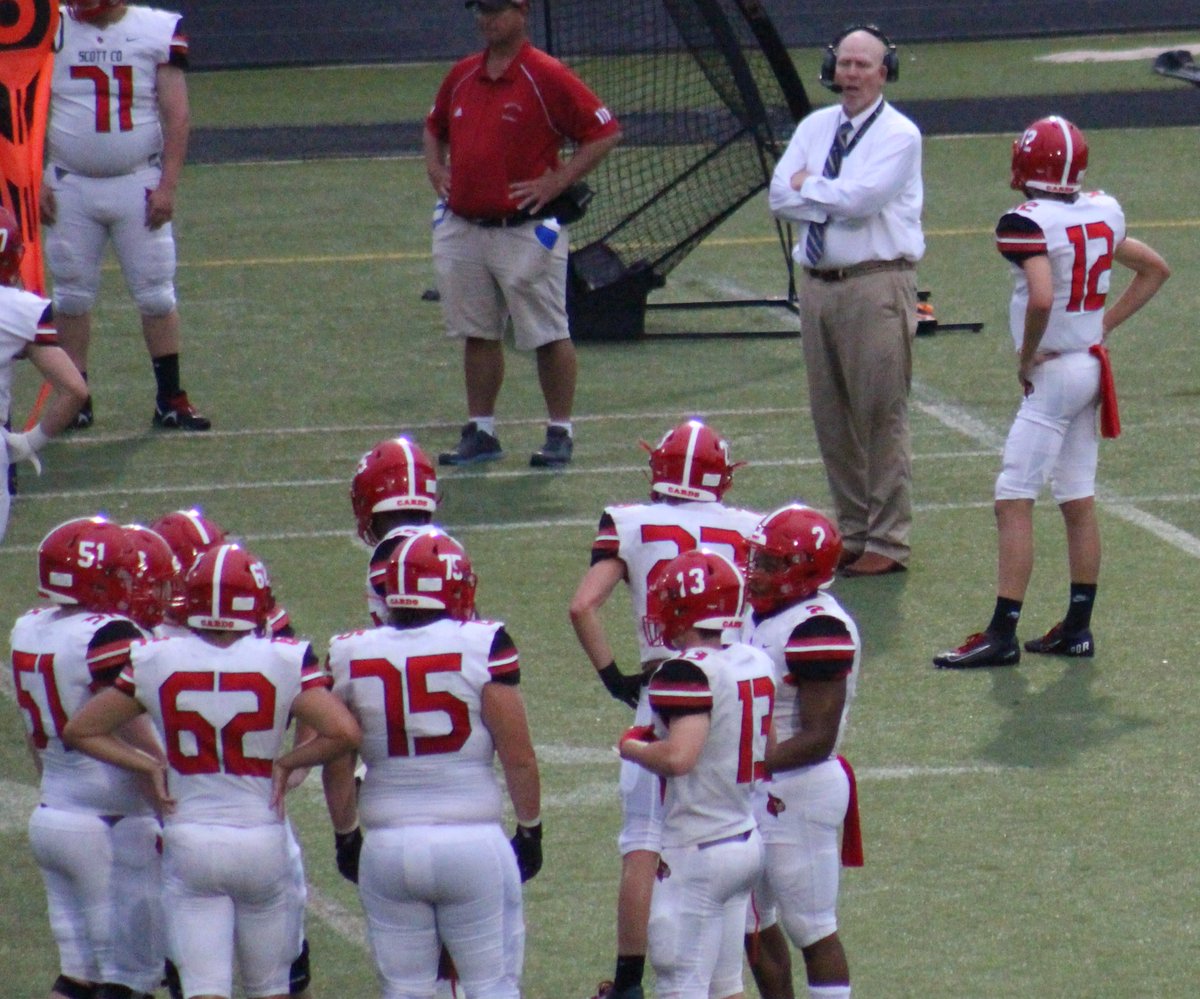 NateInSports's tweet photo. Scott County freshman QB Andrew Hickey looks to Cardinals coach Jim McKee for the play call during the first quarter Friday at Lexington Lafayette.

While Scott County punted on that first possession, Hickey rebounded to throw a 60-yard TD pass on the Cardinals' 2nd possession https://t.co/HorM3SX7lJ