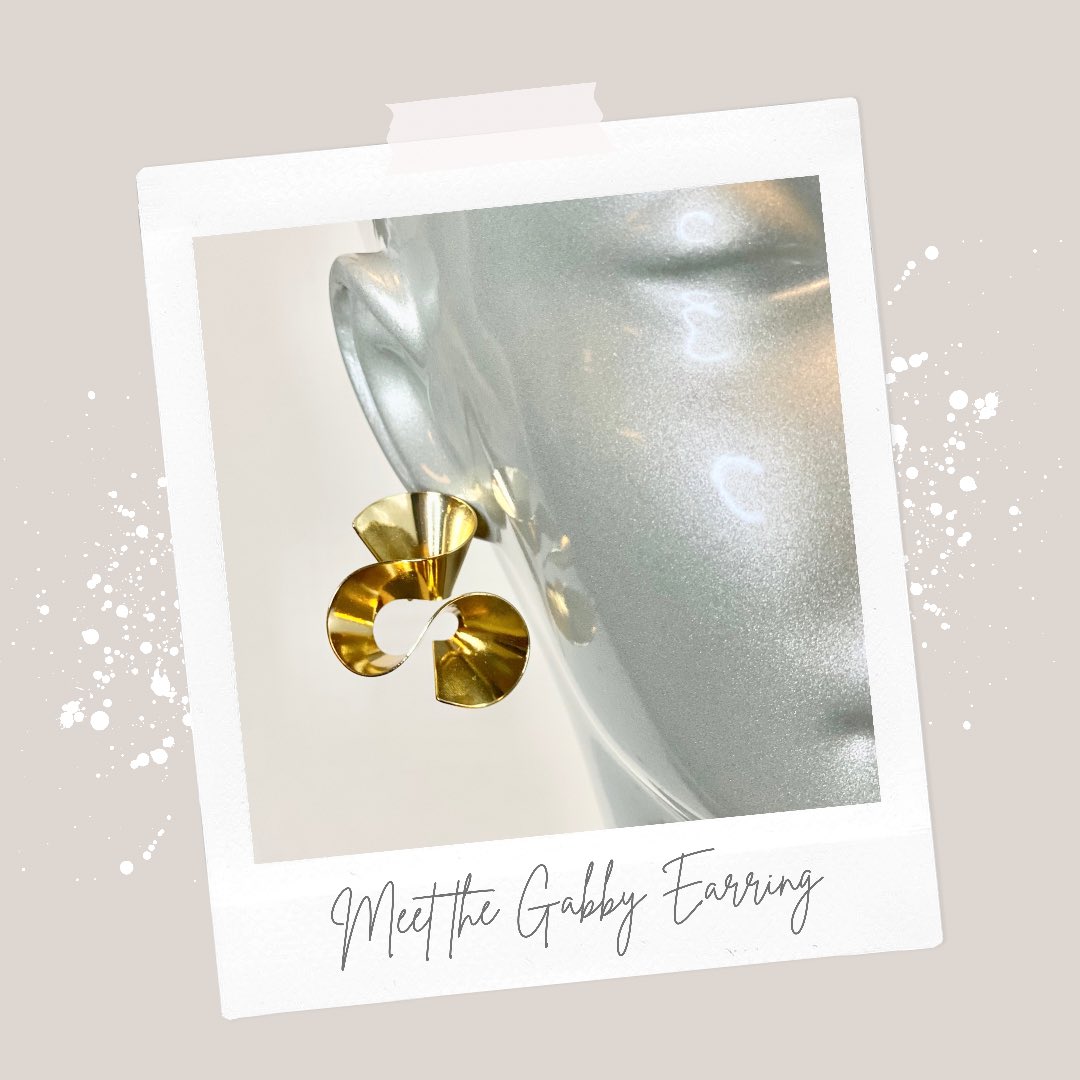 Sculptural accessories, like our golden Gabby Earring, boost any look with an additional moment of interest. Come in to the boutique and shop accessories for your next event!🦋👗✨ #stylegram #fashion