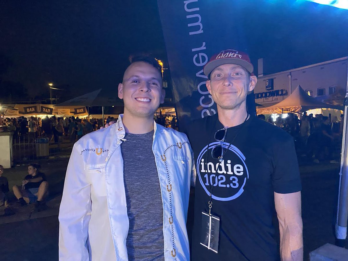 Indie1023's tweet photo. We love when our local musicians come by the tent to say hi! Here’s Mario from Immigrant’s Child with Host @jasonthomas93! #TheUMS https://t.co/PYD0wA3gbs