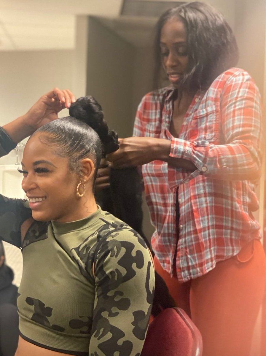 Bianca Belair shares a photo of <a href="/NaomiWWE/">Naomi</a> helping her with her signature braid on her Instagram Story. 

Captions it "Sometimes this the therapy you need"