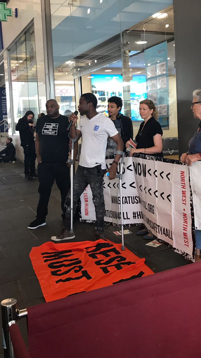 raparuk's tweet photo. Protest in Manchester today. TUI must stop collaborating with the Government in its dangerous policy of forcing families apart and deporting people to unsafe situations
#TUIDropDeportations 
#StopTheFlights
#StatusNow4All https://t.co/JSOIFdZcpw