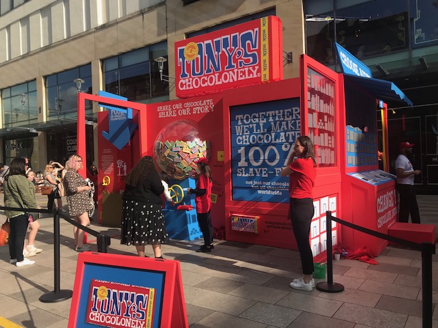 DPfairtrade's tweet photo. @TonysChocoUK_IE making a stir in Cardiff today - showing why change is needed in the chocolate industry and GIVING OUT FREE CHOCOLATE BARS! What's not to love. They'll be back Sunday from 10am to 6pm (opposite TK Maxx) #choosefairtrade https://t.co/rowdgF4jph