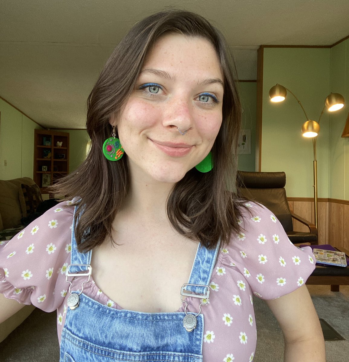 Can u tell my earrings are cells ?