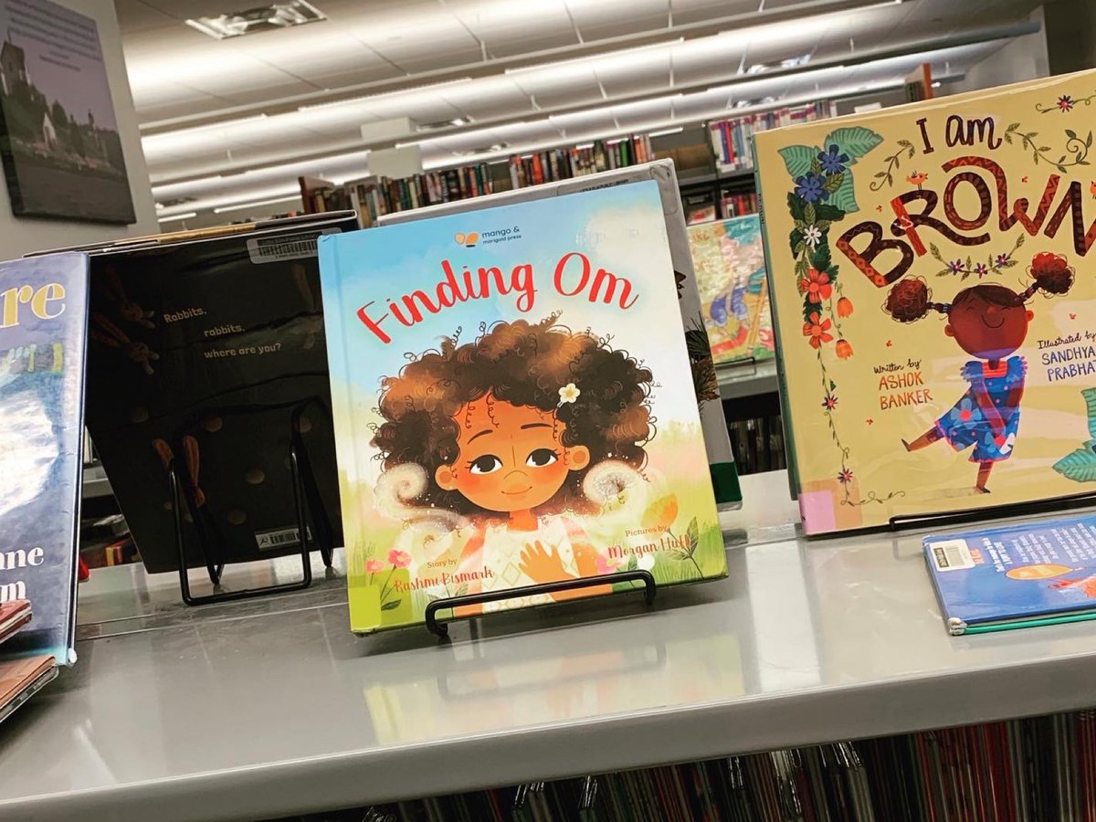 rashmibismark's tweet image. FINDING OM #BookInTheWild 📚 @LittleElmTX Public Library ♥️ and right next to another fav - I AM BROWN by @ashokkbanker and @sandhyaprabhat 🎉 
@KidlitInColor @KidLitCollectiv #SupportLocalLibraries #picturebook
