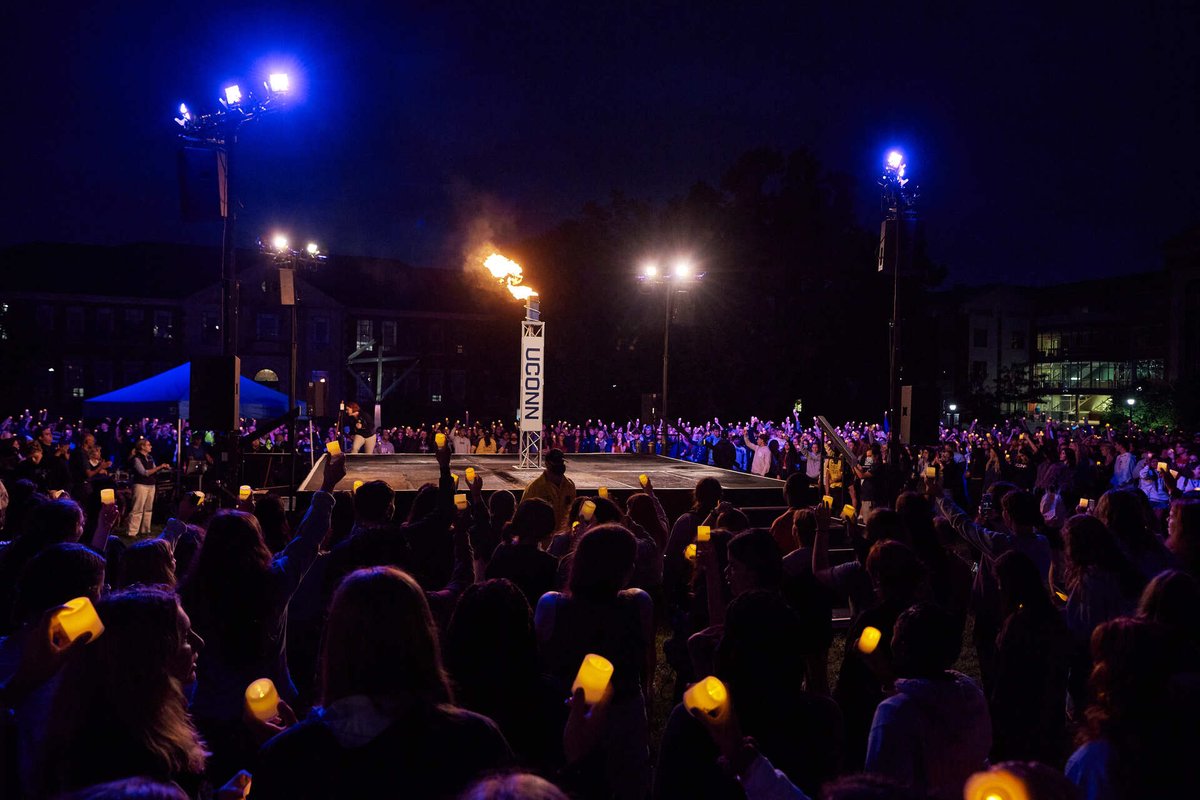 UConn's tweet photo. The entire Class of 2025 came together as one tonight for the Torch Lighting Convocation Ceremony, the official welcome into UConn Nation. #oneUConn #UConn25 https://t.co/cfTsJvrsVX